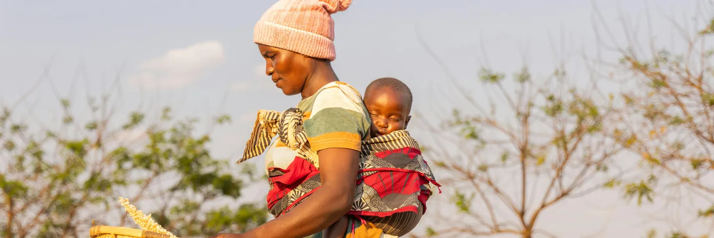 Mother and child in field