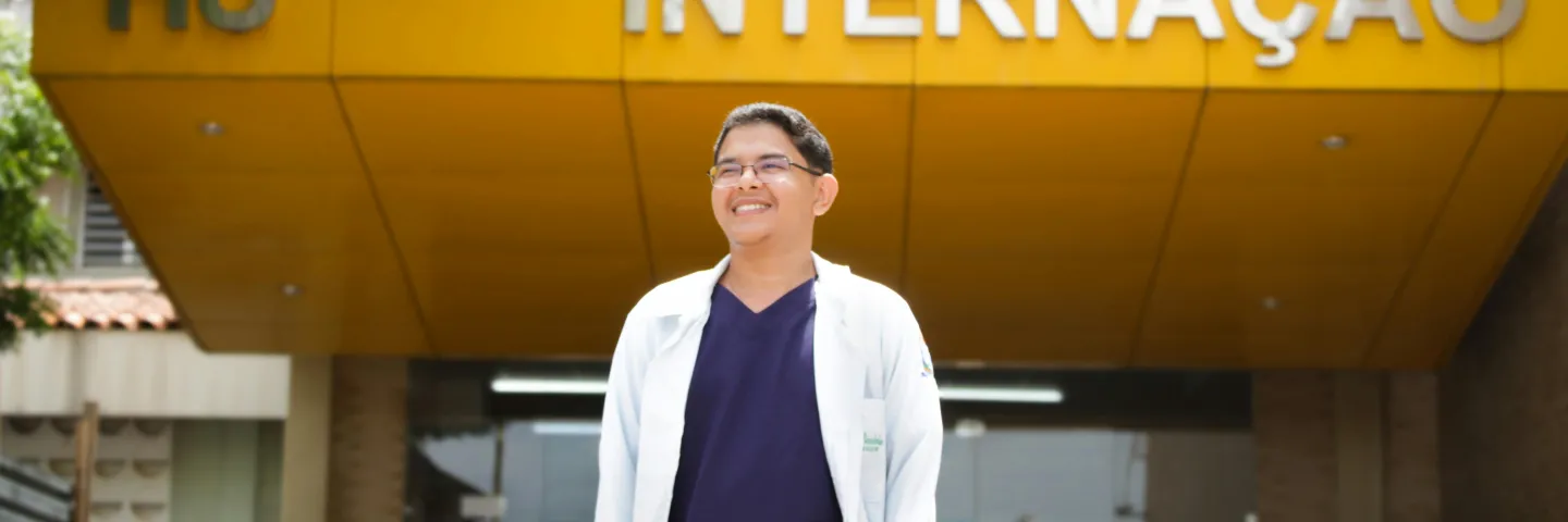 Doctor standing in front of hospital