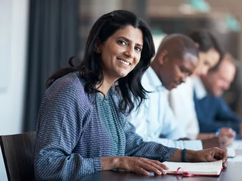 Business woman smiling at camera